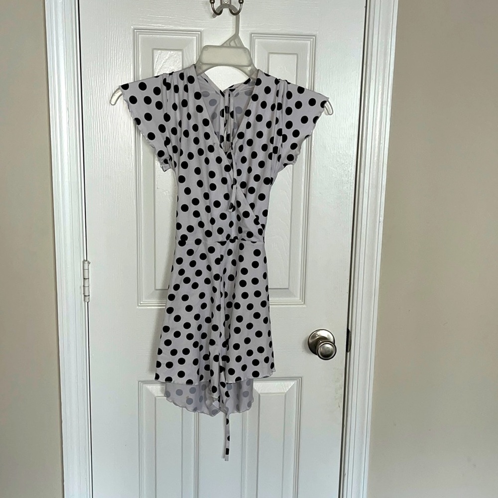 H&M, DIVIDED, size small. the colors are black and white with polka dots.